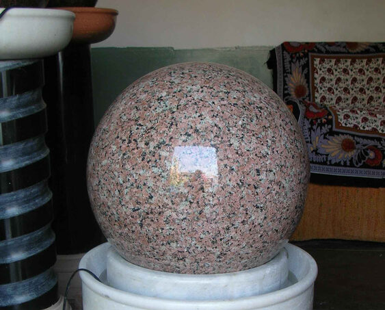 Spinning stone globe